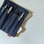 Luddite Denim Bendy Pen Case in vibrant Blue Denim from the Authentic Denim series. Compact foldable design that opens flat into a pen tray, featuring a YKK zipper and vintage workwear stitching. Made in Japan. Étui à stylos Bendy en denim bleu vif Luddite de la série Authentic Denim. Design compact pliable qui s’ouvre à plat en plateau à stylos, avec fermeture éclair YKK et coutures workwear vintage. Fabriqué au Japon.