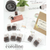 Sun-Star COROLINE compact self-inking roller stamp in Food theme, featuring a visible rubber wheel with repeating motifs of cake, coffee, croissants, tea, and pretzels. / Tampon encreur rouleau compact Sun-Star COROLINE thème Cuisine, doté d'une roulette en caoutchouc visible avec des motifs répétés de gâteau, café, croissants, thé et bretzels.