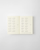 MD Notebook Diary 2027 A7 pocket size featuring minimal monthly grid spreads and cream fountain-pen-friendly MD paper. / Agenda MD Notebook Diary 2027 A7 de poche présentant des aperçus mensuels minimalistes et du papier crème MD compatible avec les stylos-plumes.