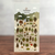 Suatelier Sticker sheet featuring a farmer with a lot of trees and various forest elements like mushrooms, animals, and leaves. / Planche d'autocollants Suatelier présentant un fermier avec de nombreux arbres et divers éléments forestiers tels que des champignons, des animaux et des feuilles.