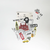 Suatelier Travel Sticker Set Some Place featuring large and small travel stickers representing Russia, the UK, and the US. / Ensemble d'autocollants de voyage Suatelier Some Place présentant de grands et petits autocollants de voyage représentant la Russie, le Royaume-Uni et les États-Unis.
