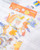 dodolulu Matte Sticker Sheet The Sun-kissed featuring radiant golden hour elements and cheerful sunlit illustrations. / Planche d'autocollants mats dodolulu The Sun-kissed présentant des éléments radieux de l'heure dorée et des illustrations ensoleillées.