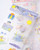 dodolulu Matte Sticker Sheet The Miracle Box featuring nostalgic childhood toys and whimsical discoveries. / Planche d'autocollants mats dodolulu The Miracle Box présentant des jouets d'enfance nostalgiques et des découvertes fantaisistes.