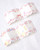 dodolulu Memo Sticker Roll Berry Tales featuring fresh strawberry illustrations and 8 repeating memo designs. / Rouleau de notes adhésives dodolulu Berry Tales présentant d'adorables illustrations de fraises et 8 motifs de mémos répétés.