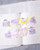 dodolulu Memo Sticker Roll Easy Afternoon featuring cozy lifestyle scenes with irregular varied widths on premium writing paper. / Rouleau de notes adhésives dodolulu Easy Afternoon présentant des scènes de vie confortables avec des largeurs variées sur papier d'écriture supérieur.