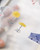 dodolulu doremi PET Tape Miles Away featuring pre-cut glossy clear stickers with whimsical watercolor travel and daydream illustrations. / Ruban PET pré-découpé dodolulu doremi Miles Away présentant des autocollants transparents brillant avec des illustrations à l'aquarelle de voyage et de rêverie.