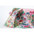 Hobonichi Techo A5 Cousin Cover Yumi Kitagishi: White Cat Village. Polyester cover printed with a densely illustrated village of white cats and animals, pale-green lining and floral Tyrolean-style pen holders. Couverture Hobonichi Techo A5 Cousin Yumi Kitagishi : White Cat Village. Polyester imprimé d’un village de chats blancs et d’animaux, doublure vert pâle et porte-stylos façon ruban tyrolien.