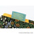 Hobonichi Techo A5 Cousin Cover V&A Series: Blackthorn. Polyester cover with J. H. Dearle Blackthorn blossom on the front, Leicester foliage on the back, yellow lining and a woven Morris-quote pen holder. Couverture Hobonichi Techo A5 Cousin V&A Series : Blackthorn. Polyester avec fleurs Blackthorn de J. H. Dearle au recto, feuillage Leicester au verso, doublure jaune et porte-stylo tissé à citation de Morris.