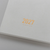 TAKE A NOTE 2027 Regular Planner A5 English version. Near-white A5 planner on Tomoe River S paper with two-days-per-page weekly layout, 3.5 mm grid and 180° flat opening. Agenda TAKE A NOTE 2027 Regular Planner A5 version anglaise. Agenda A5 blanc cassé sur papier Tomoe River S, deux jours par page, quadrillage 3,5 mm et ouverture à plat 180°.