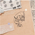 Some Sort of Fern French Afternoon Rubber Stamp Brunch Time! A dark beech stamp, 40 × 30 × 20 mm, from the French Afternoon series. Tampon Some Sort of Fern French Afternoon Brunch Time! Tampon en hêtre foncé, 40 × 30 × 20 mm, de la série French Afternoon.