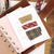 BGM School Colours Washi Tape Set Caramel. Three foil-stamped washi rolls (15 / 20 / 30 mm × 3 m) in caramel school-uniform checks. Set de rubans washi BGM School Colours Caramel. Trois rouleaux washi dorés (15 / 20 / 30 mm × 3 m), carreaux d’uniforme caramel.