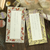 BGM Flower & Leaf Washi Tape Rose (2 cm). A 20 mm × 5 m foil-stamped washi roll of roses and foliage in a low-colour, print-like finish. Ruban washi BGM Flower & Leaf Rose (2 cm). Rouleau washi 20 mm × 5 m doré, roses et feuillage, encre à deux tons, aspect gravure.