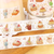 BGM Life Washi Tape Coffee Time (1.5 cm). A 15 mm × 5 m foil-stamped washi roll of café and coffee-shop motifs. Ruban washi BGM Life Coffee Time (1,5 cm). Rouleau washi 15 mm × 5 m, motifs de café et dorure, série Life.