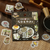BGM Today’s Cafe Sticker Set Old House Cafe. A foil-stamped flake pack of 45 old-house café stickers (15 designs × 3) in a 90 × 100 mm sleeve. Set d’autocollants BGM Today’s Cafe Old House Cafe. 45 stickers café maison ancienne dorés (15 motifs × 3), pochette 90 × 100 mm.