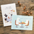 Cozyca × Mariko Fukuoka Postcard Set Tea Time. Ten 100 × 148 mm postcards in five animal tea-party designs. Set cartes postales Cozyca × Mariko Fukuoka Tea Time. Dix cartes 100 × 148 mm, cinq goûters d’animaux.