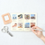Kutsuwa Piclog Journal Momo Soufflé. A 154 × 110 × 8 mm undated photo diary, peach PVC cover, 144 pages. Journal Kutsuwa Piclog Momo Soufflé. Journal photo non daté 154 × 110 × 8 mm, couverture PVC pêche, 144 pages.
