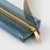 MIDORI Book Band Pen Case Transparent Navy pencil pouch with khaki band. / Trousse a stylos transparente bleu marine MIDORI avec bande elastique kaki.