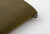 TRAVELER'S Notebook Starter Kit Regular Size in Olive. A forest green leather cover shown with a blank refill, blue-gray spare elastic, and a cotton bag. Kit de démarrage TRAVELER'S Notebook Taille Régulière en Olive. Une couverture en cuir vert forêt avec une recharge vierge, un élastique bleu-gris et un sac en coton.