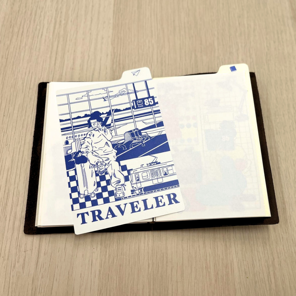 85 Rue Tranquille x thanh.illustrates Gumpy Girl Writing Mat - Traveler Edition (TN Passport Size)