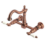 Kingston Brass Heritage Two-Handle Wall Mount Bridge Kitchen Faucet, Antique Copper - KS126PLAC
