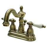 Kingston Brass Two Handle 4" Centerset Lavatory Faucet with Pop-Up Drain Drain - Vintage Brass KB1603PL