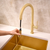 Ruvati Vestia Single Handle Pull Down Kitchen Faucet Knurled Modern Arc with Sprayer in Brushed Gold - RVF1237SG