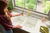 Ruvati Idris Single Handle Pull Down Kitchen Faucet Tall High Arc Gooseneck with Sprayer in Brushed Gold - RVF1239SG