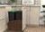 Rev-A-Shelf Craftsman Collection Double Black 50 Qt. Solid Walnut Bottom Mount Pullout Waste Container w/ Black Accents, (2) Lids and BLUM Soft-Close Slides for 18" Base Cabinets - 4WCCC-WN-1850DM-218MB