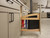 Rev-A-Shelf Craftsman Collection Solid Maple Base Cabinet Pullout w/ Tray Divider/Foil Wrap Holder, Black Accents and BLUM Soft-Close Slides for 9" Base Cabinets - 447CC-BCSC-5MB