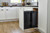Rev-A-Shelf Steel Double Black 50 Qt. Bottom Mount Pullout Waste Container w/ Soft-Close for 21" Base Cabinets - 53WC-2150SCDM-218