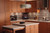 Kraftmaid Kitchen Cabinets - Slab - Veneer (AB4C) Quartersawn Cherry in Natural