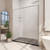 DreamLine Flex 30 in. D x 60 in. W x 74 3/4 in. H Semi-Frameless Pivot Shower Door in Chrome with Right Drain Black Base Kit