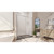 DreamLine Flex 36 in. D x 60 in. W x 74 3/4 in. H Semi-Frameless Pivot Shower Door in Chrome with Left Drain Black Base Kit