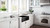 Ruvati 30 x 20 inch Fireclay Reversible Farmhouse Apron-Front Kitchen Sink Single Bowl - Glossy Black - RVL2100BK
