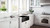 Ruvati 33 x 20 inch Fireclay Reversible Farmhouse Apron-Front Kitchen Sink Single Bowl - Gloss Black - RVL2300BK