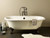 Cheviot 2110-BC-6-PB REGAL Cast Iron Bathtub with Faucet Holes - 68" x 31" x 24" w/ Polished Brass Feet