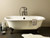 Cheviot 2110-WC-6-WH REGAL Cast Iron Bathtub with Faucet Holes - 68" x 31" x 24" w/ White Feet