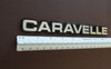 Original 1985-1986-1987-1988 Plymouth Caravelle Trunk Lid Emblem 