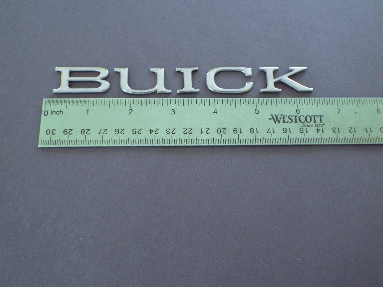 1997-1998-1999-2000-2001-2002-2003-2004-2005 Buick Century-Buick Park Avenue BUICK Letters Rear Bumper Emblem