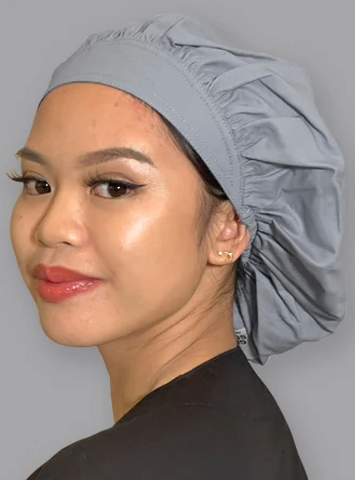 medical professional wearing a bouffant scrub hat