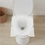Genuine Joe GJO10154 Quarter-Fold Toilet Seat Covers in use