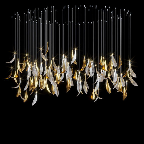 Immerse yourself in the opulent allure of a luxury white and gold glass feather chandelier. This exquisite masterpiece combines the delicate beauty of feathers with the richness of white and gold accents. Meticulously crafted, each glass feather is meticulously shaped and adorned with lustrous gold details, creating a stunning visual symphony of elegance. As light dances through the translucent feathers, a warm and enchanting glow fills the room, casting a captivating ambiance that enchants all who behold it. Suspended from a gilded frame, this chandelier serves as the epitome of luxury, adding a touch of glamour and sophistication to any space it graces. Indulge in the ethereal beauty of this extraordinary statement piece.