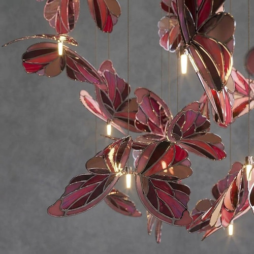 Stained glass butterfly chandelier

Custom glass art lighting

Luxury ceiling installation

Handcrafted glass butterfly light sculpture

Modern luxury lighting design