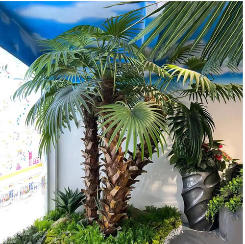 Elevate your space with Paco's lifelike artificial palm trees. Our imitation palm tree collection offers stunning realism and versatility for indoor and outdoor settings alike. Crafted with meticulous attention to detail, each palm exudes natural beauty without the maintenance hassle. Whether adorning residential living areas, office environments, or outdoor patios, Paco's artificial palms add a touch of tropical elegance. Available in various sizes and styles, including towering specimens reaching heights of 6 meters or more, our imitation palms suit a wide range of design preferences. Say goodbye to watering and pruning – bring the beauty of the tropics home with Paco's artificial palm trees.