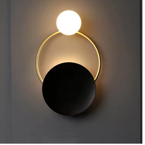 Illuminate your interior with sophistication using Vida's Black and Gold Ultra Modern Wall Lights. Featuring sleek designs and opulent finishes, these fixtures add a touch of luxury to any space. The bold contrast of black and gold creates a striking visual impact, making them ideal for modern interiors. Whether installed in living rooms, bedrooms, or hallways, these wall lights serve as stylish accents, elevating the ambiance with their contemporary elegance. Experience the perfect blend of modern design and timeless luxury with Vida's Black and Gold Ultra Modern Wall Lights, enhancing your interior with refined sophistication.