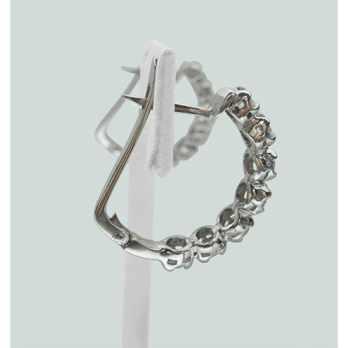 luxury diamond hoop earrings, 2.5 carat diamond earrings, VS1 clarity diamond hoops, F color diamond jewelry, fine white gold earrings, 14K gold diamond hoops, natural earth-mined diamonds, round brilliant cut diamond hoops, high jewelry earrings, elegant diamond hoop earrings, bespoke fine jewelry, investment-grade diamond earrings, collector’s diamond jewelry, sophisticated women's accessories, exclusive diamond hoop design