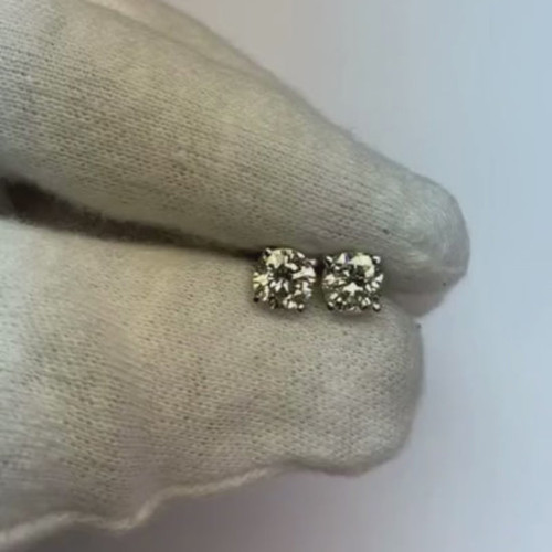 luxury diamond stud earrings, 1.50 carat diamond earrings, VS1 clarity diamond studs, F color diamond jewelry, natural earth-mined diamonds, fine jewelry for women, brilliant round cut diamonds, 14K white gold earrings, prong set diamond studs, investment grade diamond jewelry, certified diamond earrings, exquisite women's jewelry, high jewelry diamond studs, sophisticated diamond accessories, heirloom quality diamond earrings