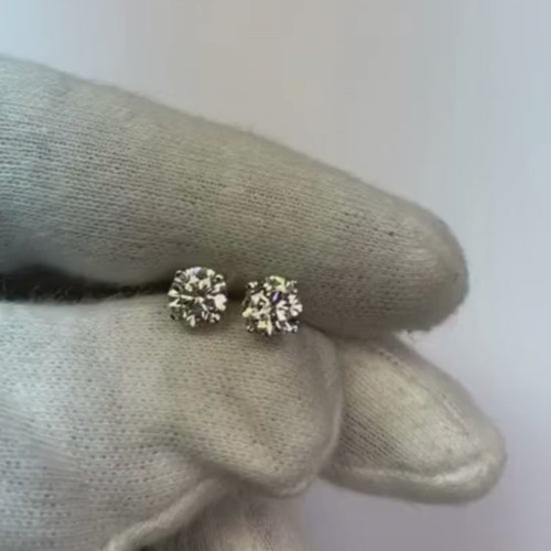 luxury diamond stud earrings, VS1 clarity diamond earrings, F color diamond studs, natural earth-mined diamonds, round brilliant cut diamond earrings, 1.50 carat total weight diamond studs, four prong setting diamond earrings, high jewelry diamond studs, 14K white gold diamond earrings, investment-grade diamond jewelry, certified diamond earrings, heirloom quality diamond studs, exclusive fine jewelry, sophisticated diamond accessories, bespoke diamond earrings
