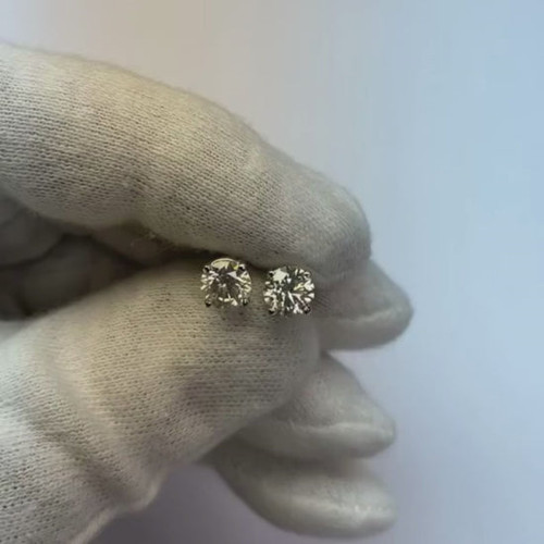 luxury diamond stud earrings, 1.50 carat diamond studs, G color diamond earrings, SI1 clarity diamond jewelry, natural earth-mined diamonds, fine round cut diamond earrings, 14K white gold diamond studs, high jewelry diamond accessories, investment-grade diamond earrings, sophisticated diamond jewelry, certified diamond stud earrings, prestigious diamond jewelry, collector's fine diamond studs, bespoke white gold earrings, elegant diamond statement pieces