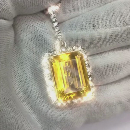 luxury citrine pendant, cushion cut citrine jewelry, 26.75 carat gemstone pendant, VVS1 diamond accents, high jewelry pendant, bespoke citrine necklace, statement gemstone pendant, 14K white gold fine jewelry, natural earth-mined citrine, collector's citrine pendant, investment-grade gemstone, exclusive jewelry design, superior clarity diamonds, handcrafted gemstone jewelry, sophisticated yellow citrine pendant